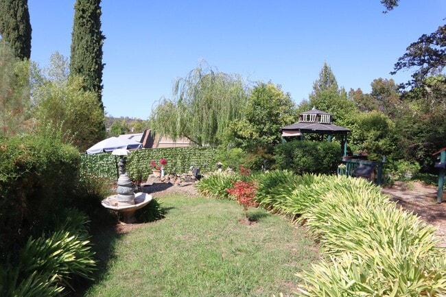 Building Photo - Oroville-Furnished-Turnkey-3 bedroom 2 bath home, hot tub, gazebo, landscaped yard, solar