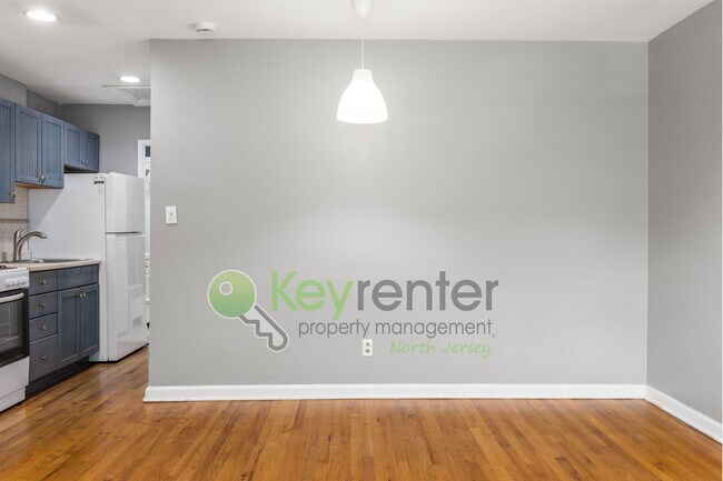 Building Photo - Quiet 2nd-Floor 1BR Condo – Updated Bath, Pet Friendly & Easy NYC Commute
