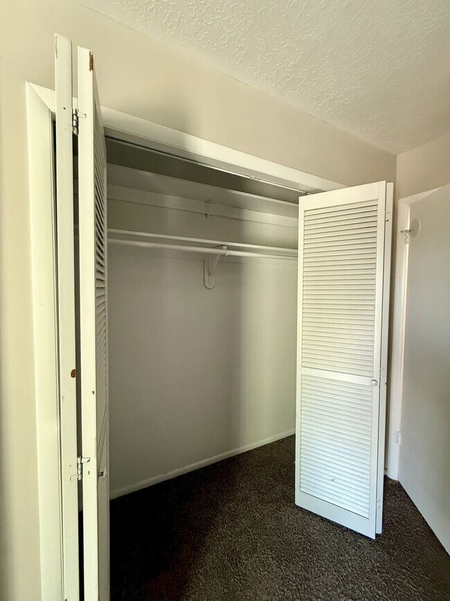 Building Photo - Spacious Comfort Meets Practical Living in...