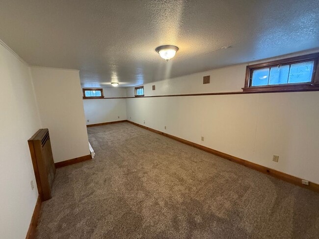 Building Photo - Two bedroom, One and half bathroom house, with additional living room, and bonus room!