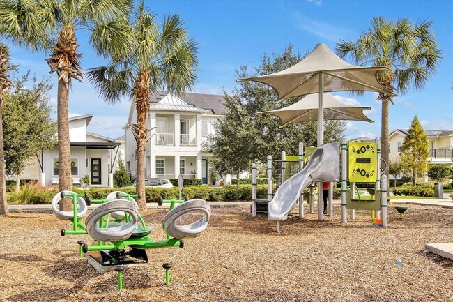 Building Photo - *Unfurnished* Beautiful 1/1 Spacious Garage Apartment in the Exclusive Laureate Park - Orlando!