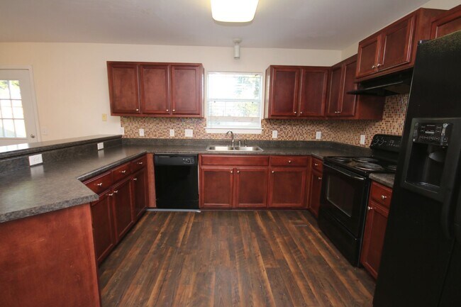 Building Photo - Spacious 4BR Home in Robin's Ridge with Soaring Ceilings, Guest Suite & Two-Car Garage