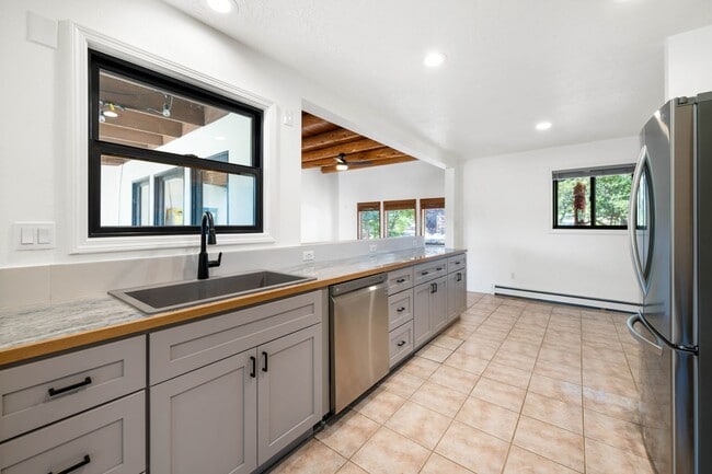 Building Photo - NEW MOVE-IN SPECIAL! Vibrant Home Off Rode...