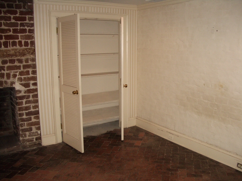 Parlor shelving - 207 W Jones St