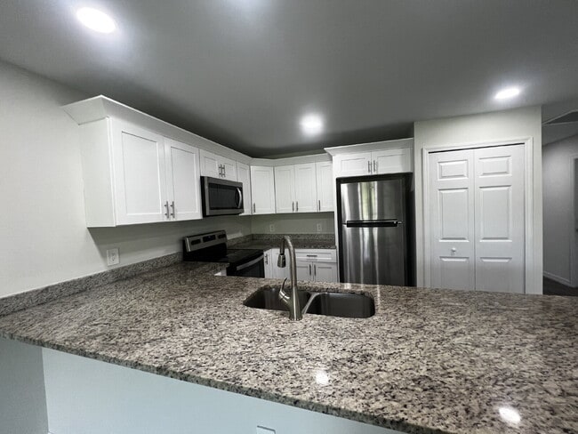 Building Photo - Move-In Special! Half Month FREE – APPLY by November 30th – Modern 3BR/2BA Duplex in Lehigh Acres...