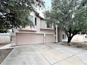 Building Photo - 7447 W Trails Dr