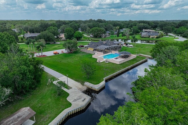 Building Photo - Beautiful 3/3 Pool Home in Gated Community W/ Lake Access