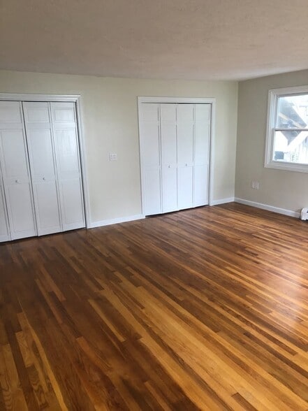 Primary bedroom with 3 large cedar closets - 89 Congress St