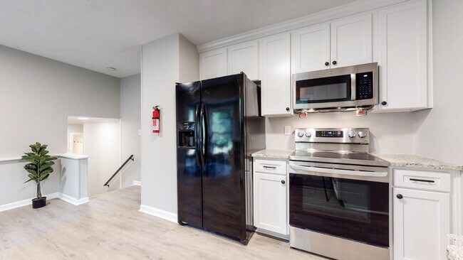 Building Photo - THE CANBERRA| Enjoy convenient living in Bedford Estates, only 2 minutes from the S Hairston Rd &...
