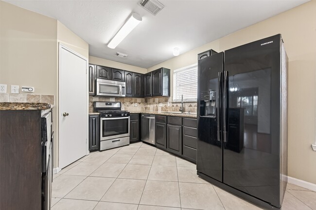 Building Photo - 8411 Tamayo Dr