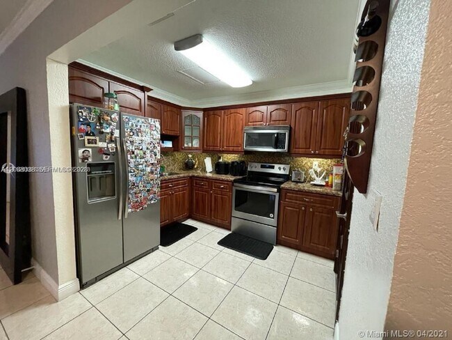 Building Photo - 12860 SW 43rd Dr