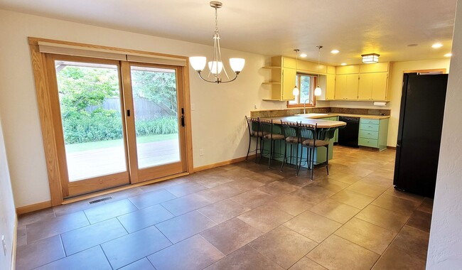 Building Photo - Gorgeous 4-bedroom home including a Two Car Garage and Spacious Backyard with a Shaded Patio