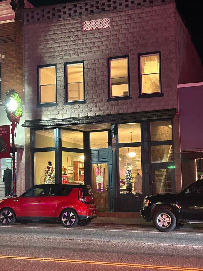 Front of building. Entrance to right of retail store. Many steps to enter front or back of unit. - 426 N Roane St