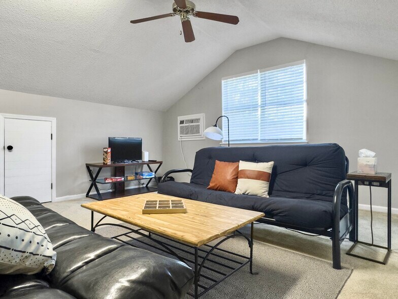 family room over the garage - 7900 Elderberry Cir