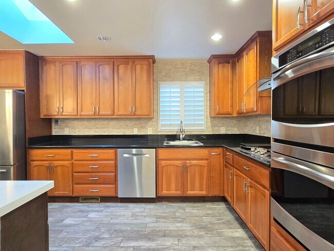 Building Photo - Large Campbell Home, Remodeled Inside, Gorgeous Kitchen, Large Master Suite, A/C, Beautiful Yards!
