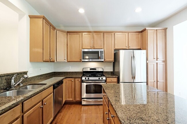 Building Photo - Dog-Friendly 4BR Cherry Hill Townhome with 2-Car Garage + Solar Panels