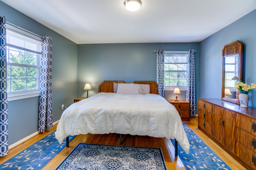 Primary Bedroom with Ensuite Bathroom - 9215 Cherrytree Dr