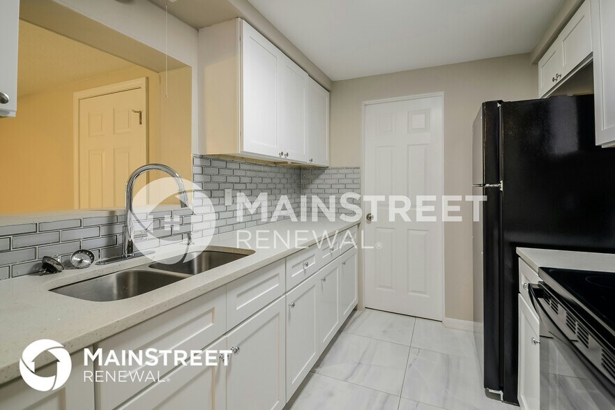 Building Photo - 703 59th Ave Terrace W