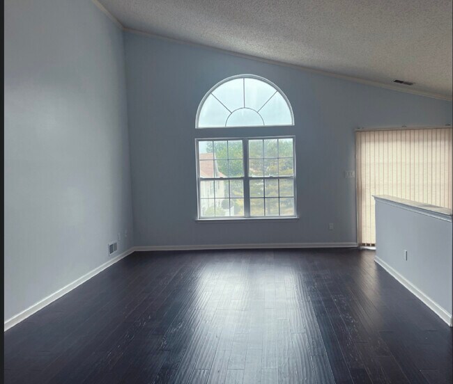 Living Room with vaulted ceiling and brand new hardwood floor - 1942 Willings Ln