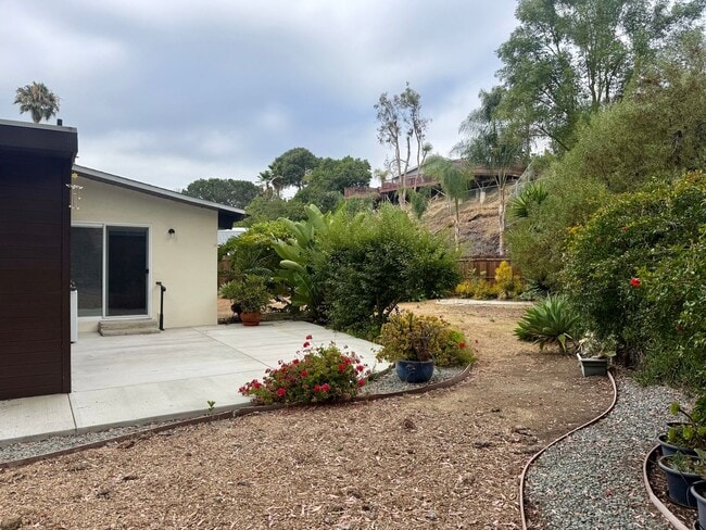 Building Photo - Bay Park Beauty | 3BD/2BA with Canyon Views & Lush Grounds