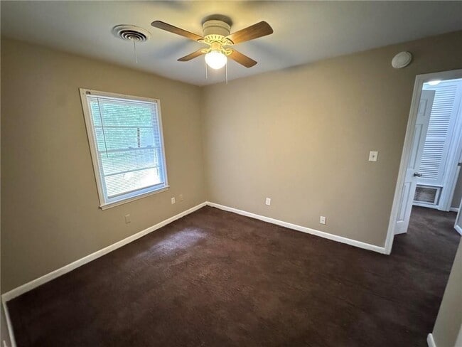 Building Photo - 5855 Woodvale Dr