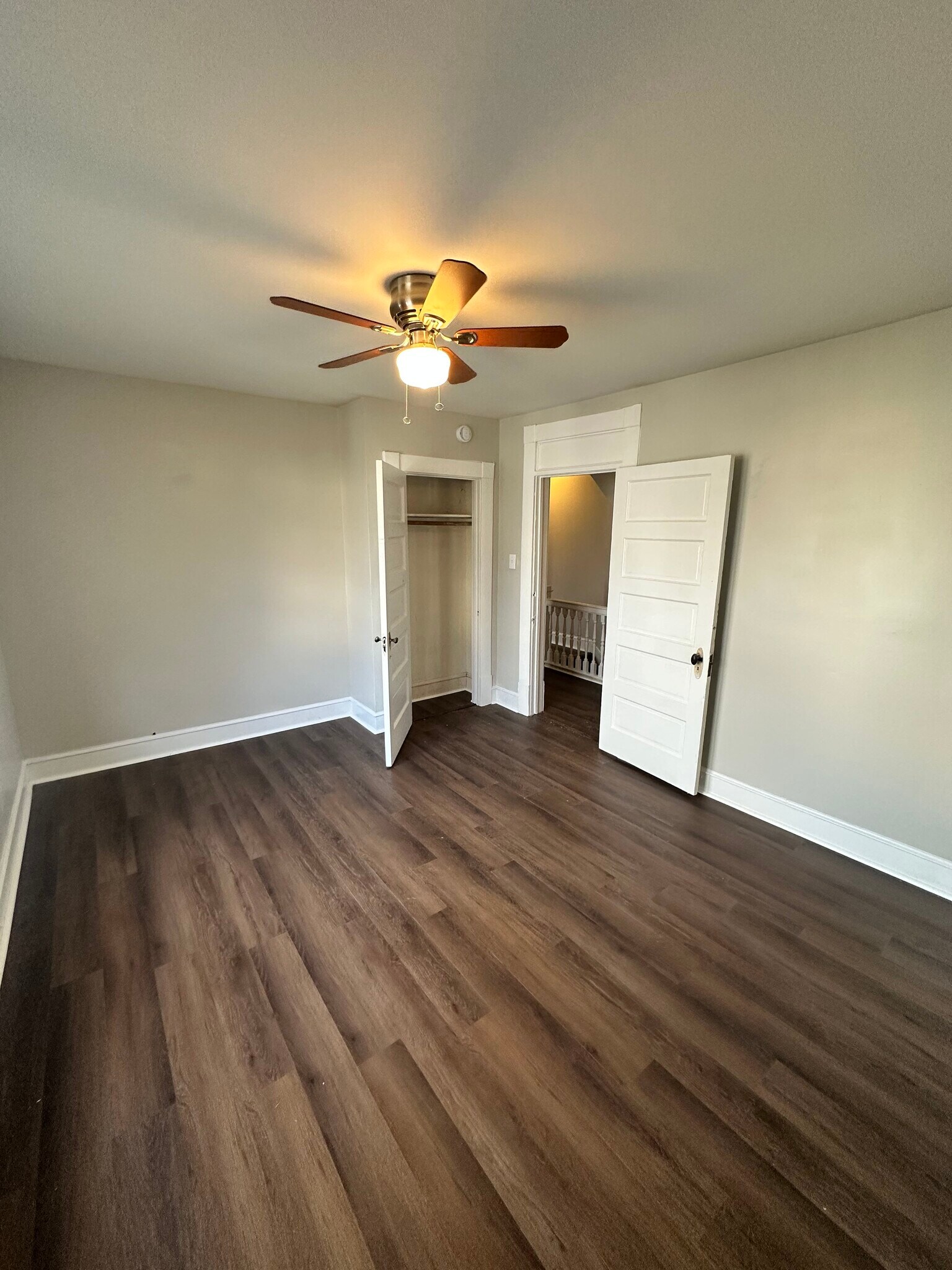 Bedroom 2 with ceiling fan - 106 S Raleigh St