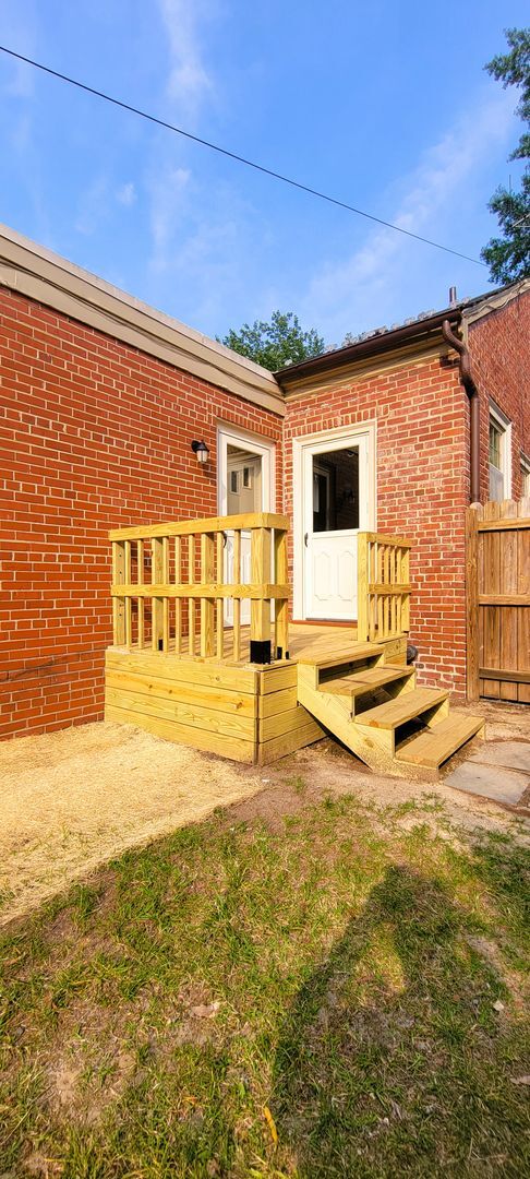 Building Photo - Remodeled brick bungalow with 1st floor li...
