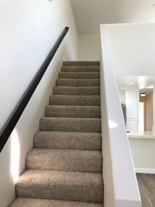 Building Photo - PICTURE PERFECT 2 BR/2 BATH PLUS LOFT END UNIT CONDO WITH DIRECT ACCESS 2 CAR GARAGE