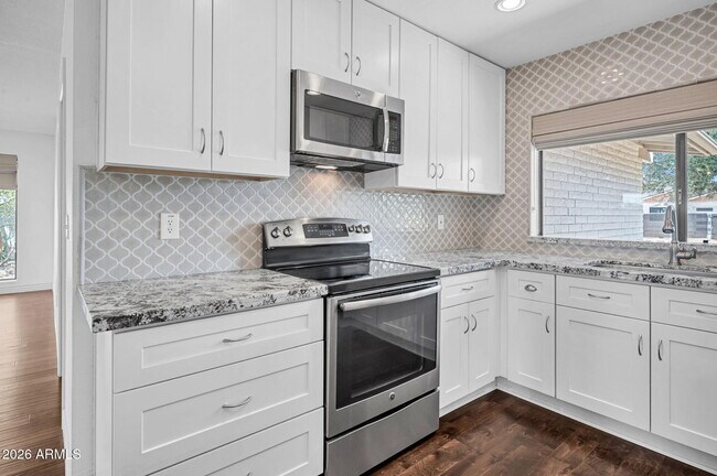 Building Photo - 5219 E Winchcomb Dr