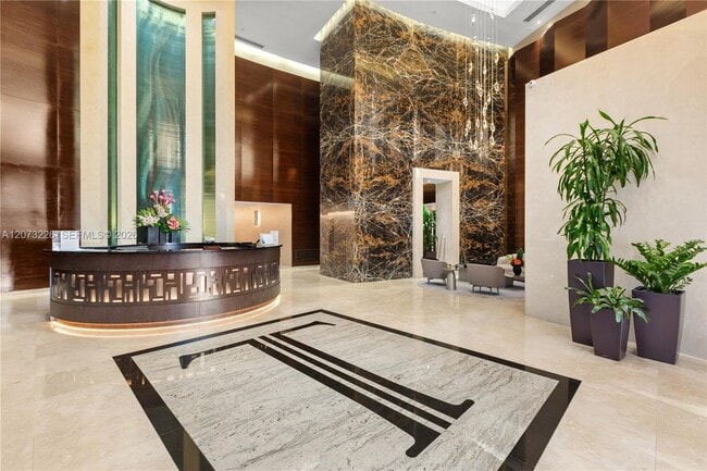 Building Photo - 15811 Collins Ave