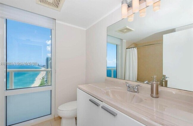 Building Photo - 16699 Collins Ave