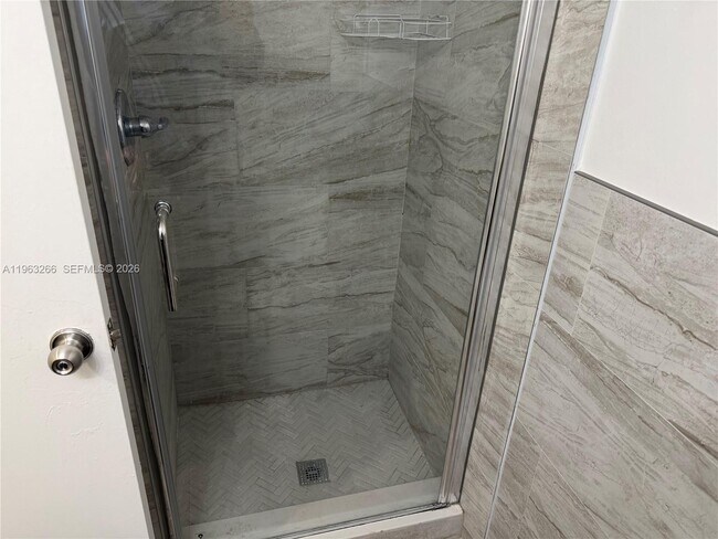 Building Photo - 2700 Coral Springs Dr