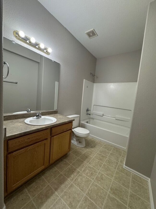 Building Photo - Charming 3BD Townhome in Gated Community just minutes from Peterson AFB & Fort Carson - Security ...