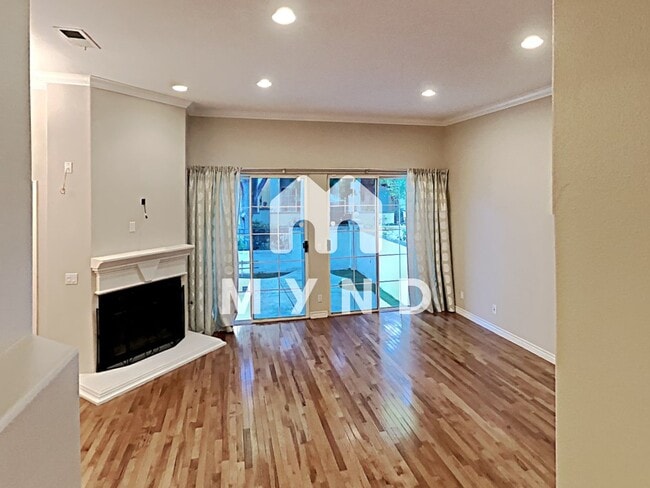Building Photo - 5117 Renaissance Ave Unit C
