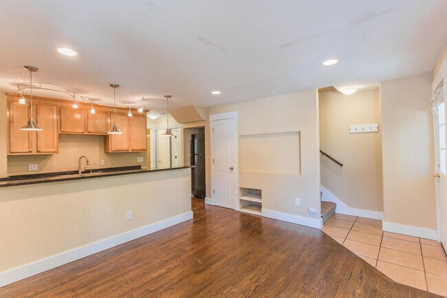 Living Room with Stairs - Boulder Buddha