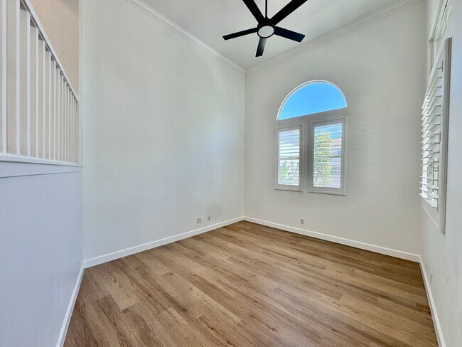 Building Photo - Beautifully Remodel Townhouse with AC & Two Car Garage!