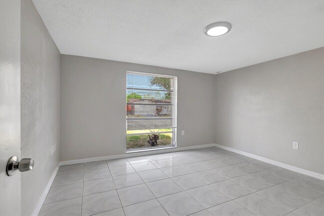 Building Photo - 7210 Parrot Dr