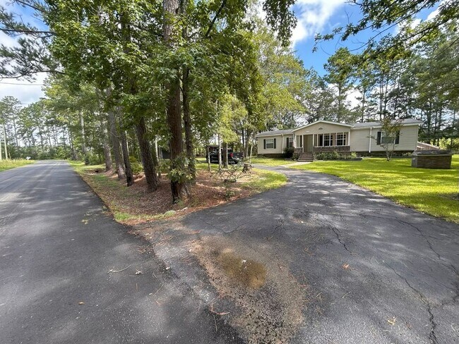 Building Photo - Immaculate 4BR Mobile Home in the heart of...