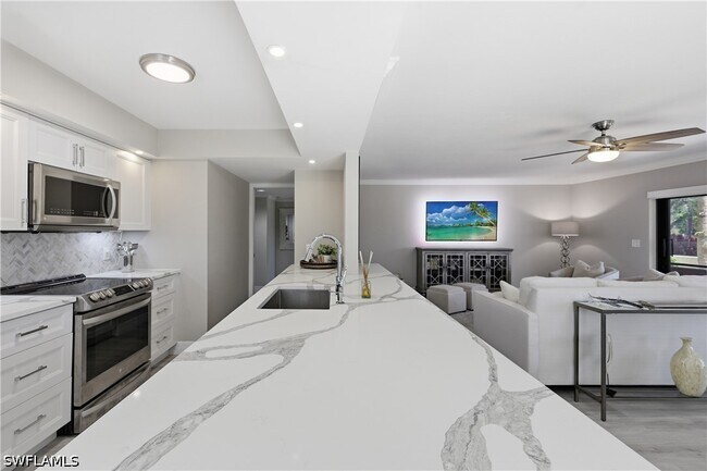 Building Photo - 6080 Pelican Bay Blvd