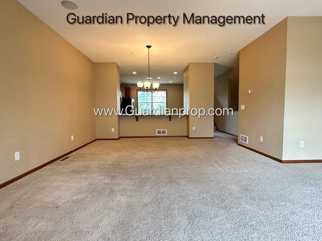 Building Photo - Pet Free Champlin Town Home, 3.5 Baths, 2 Car Garage, Dishwasher, Balcony, Available end of April