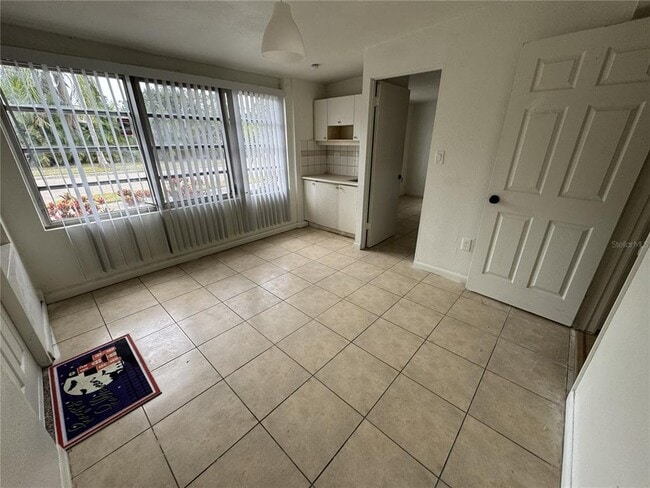 Building Photo - 4680 Royal Palm Ave