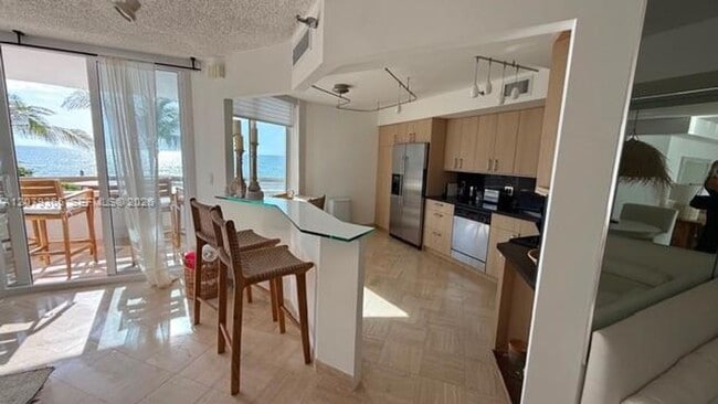 Building Photo - 15645 Collins Ave