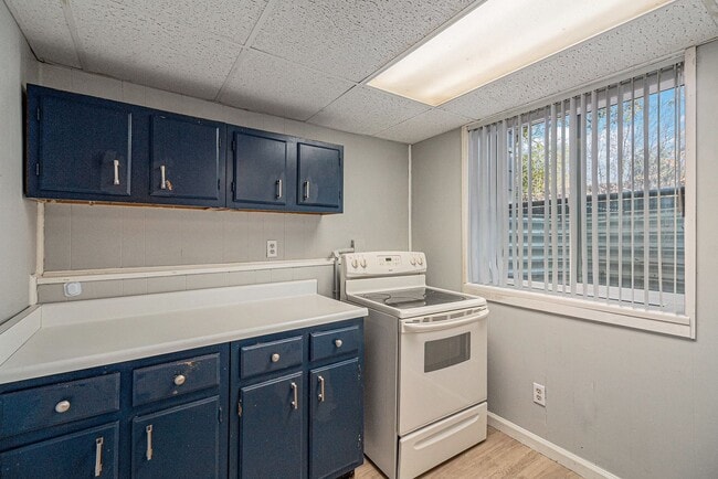 Building Photo - 7360 W.20th Ave. Unit B