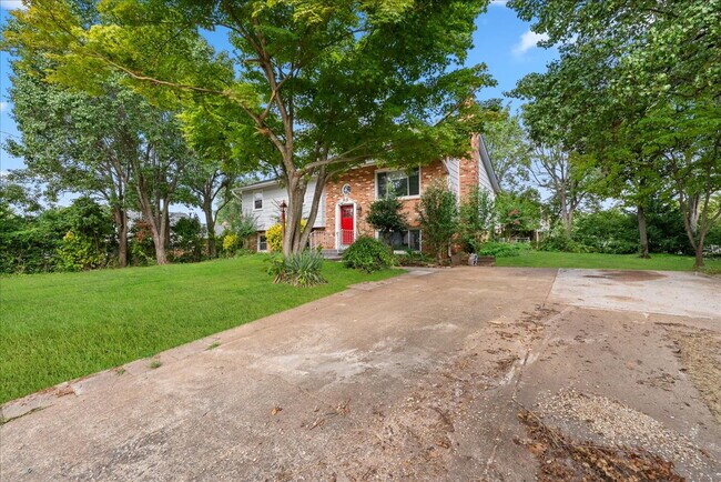 Building Photo - "Spacious 5-Bed Home with Granite Accents ...