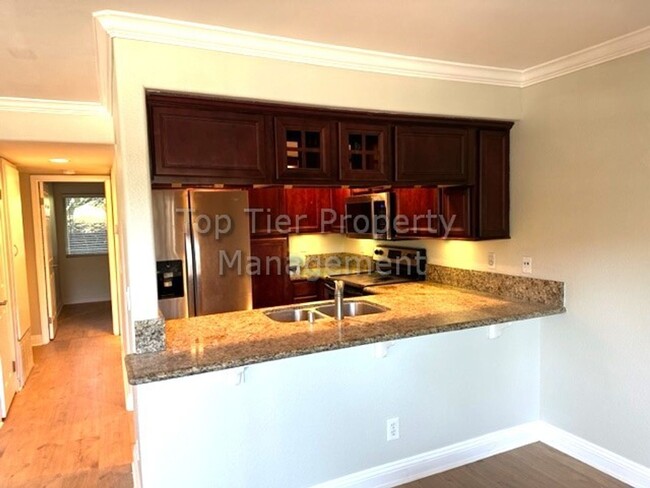 Building Photo - **Remodeled 2 bed / 2 bath Condo in Privat...