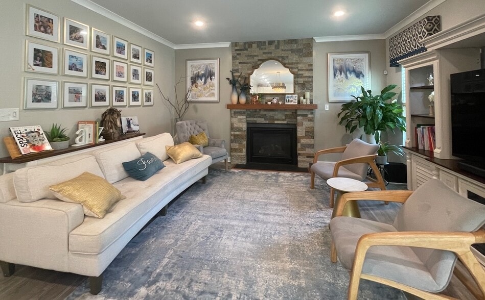 Open living room with a brick fire place - 3007 Sun Valley Dr