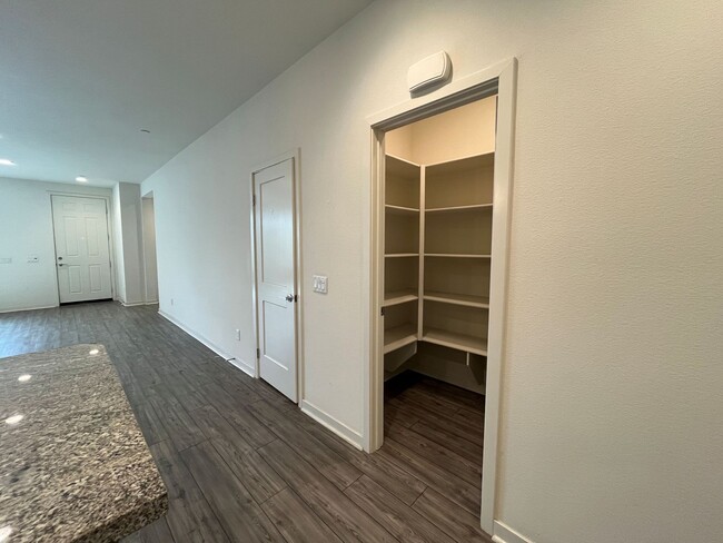Building Photo - Gated 3+2.5 w/loft, walk-in pantry + dual ...
