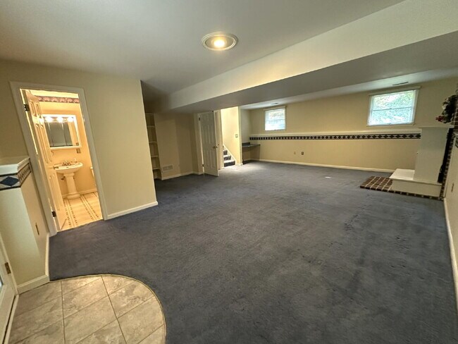 Building Photo - LEASE PENDING! 3-Bedroom Split Level in Peaceful Wooded Setting