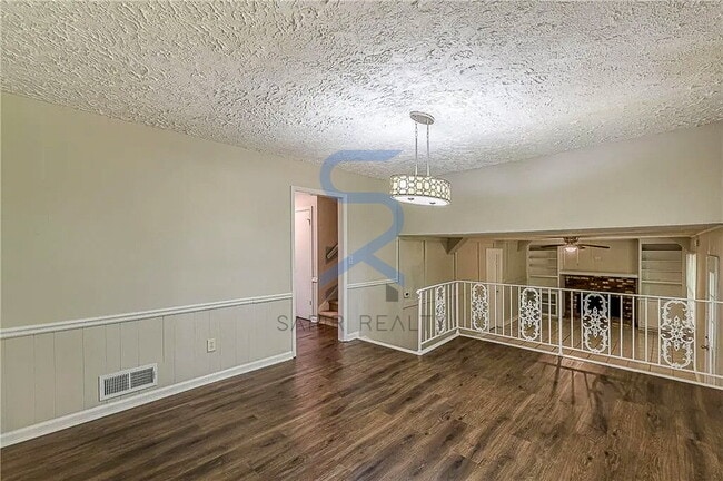 Building Photo - Move in before December 15th and choose your reward: a $250 Amazon Gift Card or a 55" Smart TV!