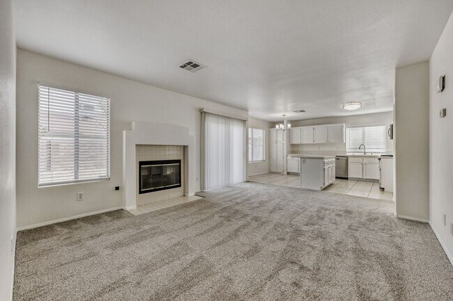 Building Photo - Fully remodeled!  Cozy 4 bedroom with 3 car garage !